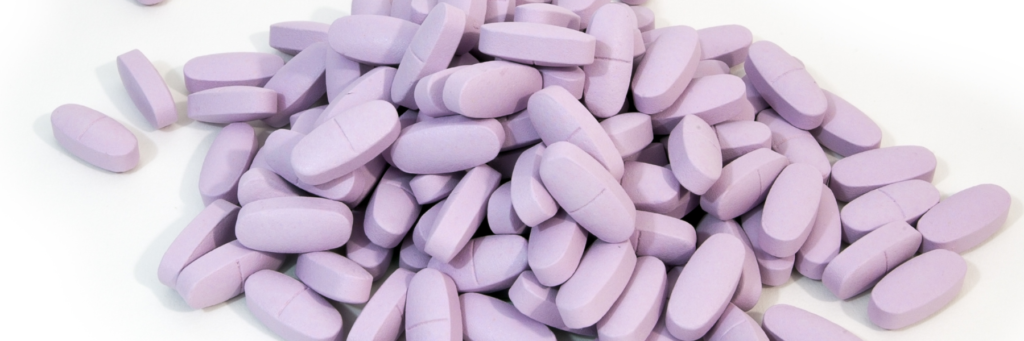 purple pills non-descript